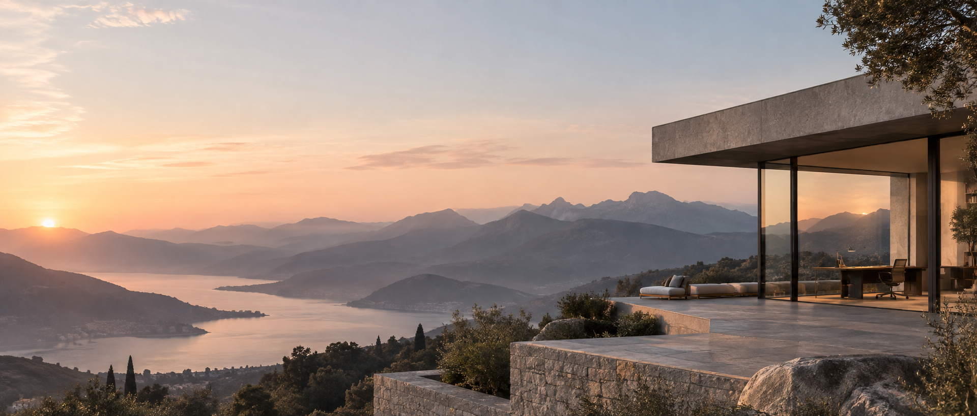 Calm modern workspace overlooking mountains at sunrise